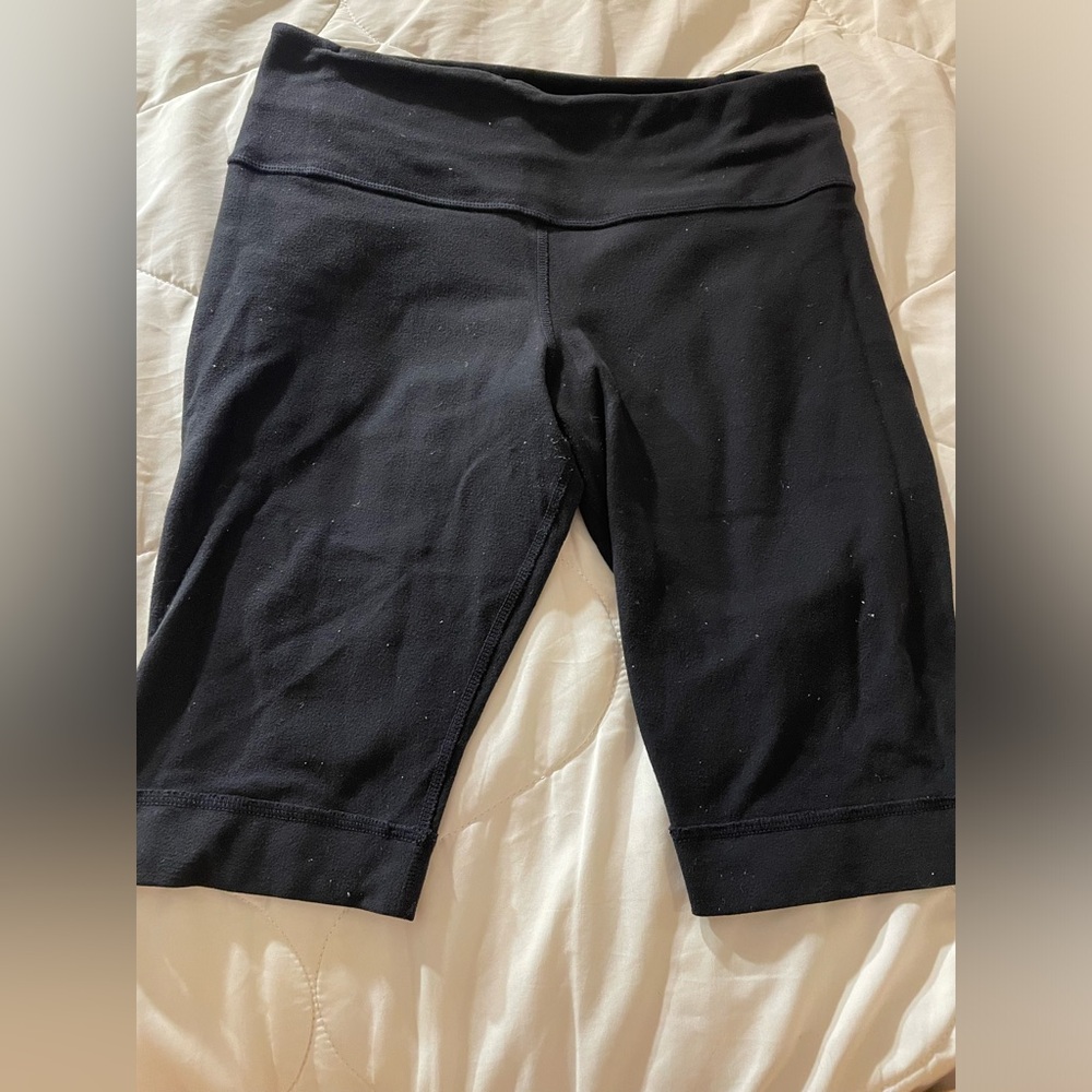 Lululemon Athletica. Thigh length shorts. Size 4. Black. Great Condition.